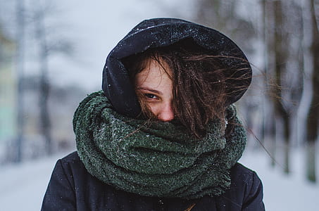 woman wearing green scarf selective focus photography thumbnail