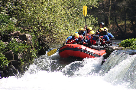men riding boat thumbnail