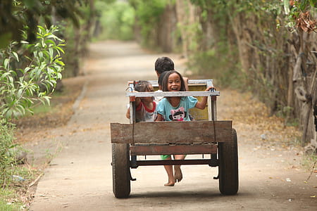 laughing girl push cart thumbnail