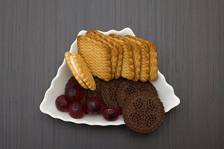 biscuits and cookies on white ceramic plate thumbnail