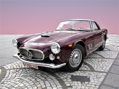 purple Maserati coupe thumbnail