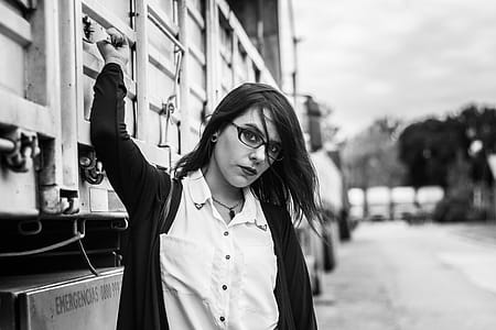 Woman With Zip-up Jacket Stand Beside Truck thumbnail