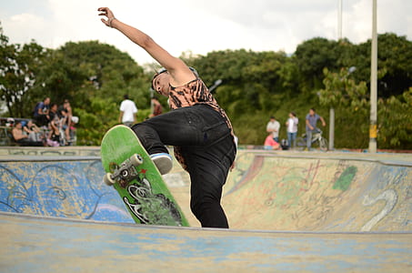 man skating during daytime thumbnail