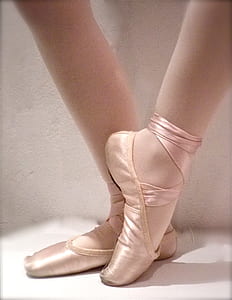 woman wearing pink ballet shoes thumbnail