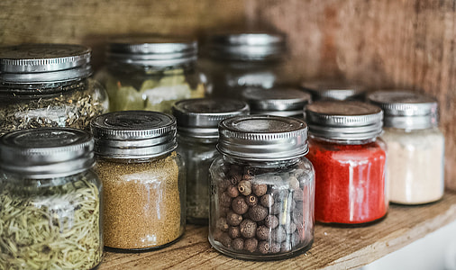 selective focus photography of clear glass canisters thumbnail