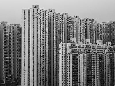 grayscale photography of highrise building thumbnail