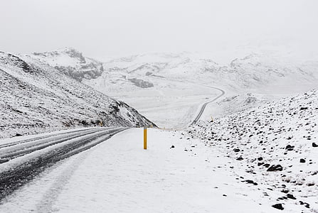 empty roadway coated with snow thumbnail