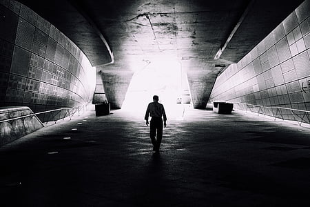 gray, scale, photo, man, walking, tunnel thumbnail
