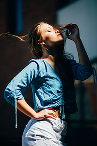 selective focus of woman holding her waist thumbnail