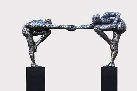 two person holding hands statue thumbnail