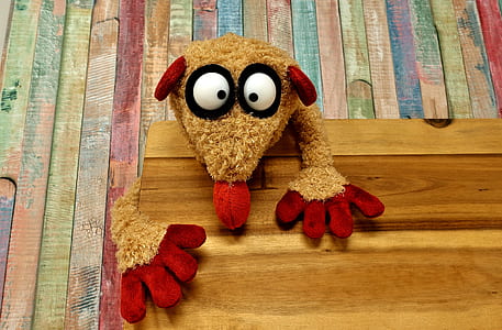 dog puppet on brown board thumbnail