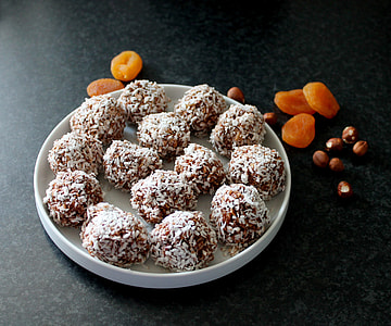 round pastries on round white ceramic plate thumbnail