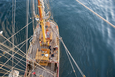 brown ship in body of water thumbnail