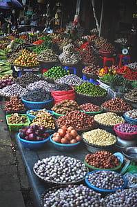various spice and vegetables displayed in a market thumbnail
