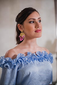 Woman Wearing Blue Strapless Dress thumbnail