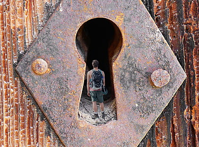 man standing inside the keyhole thumbnail