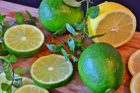 bunch of lemons on brown surface thumbnail