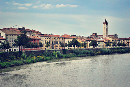 buildings beside body of water thumbnail