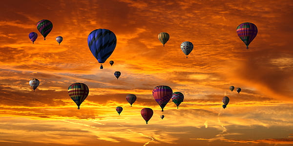 assorted-color hot air balloons up in sky thumbnail