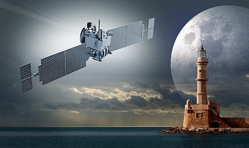 gray satellite in a distance of lighthouse thumbnail