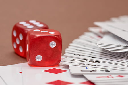 two red dice and playing cards thumbnail