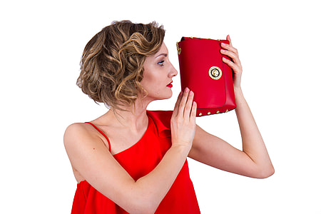 woman holding red leather wallet thumbnail