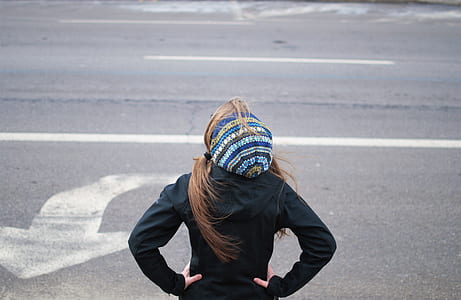 woman wearing jacket and cap thumbnail