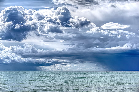 ocean under nimbus clouds thumbnail