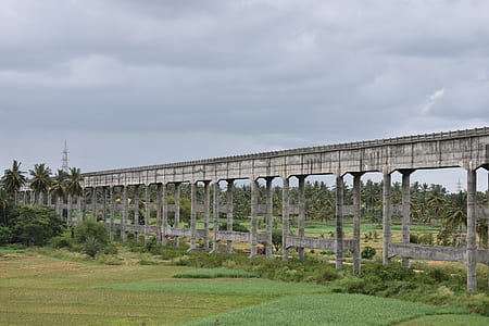 brown concrete bridge during daytime thumbnail