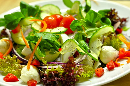 vegetable salad on round white ceramic plate thumbnail