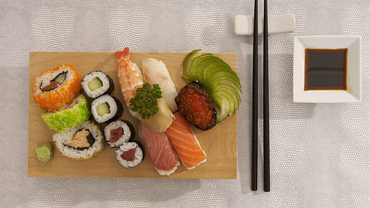 sushi platter beside chopsticks thumbnail