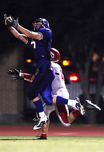 two men playing football thumbnail