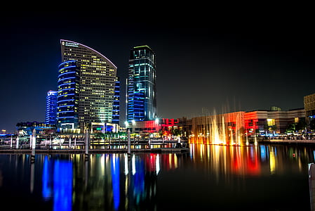City Skyline Beside Water during Night thumbnail
