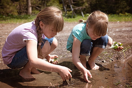 two girls playing on water thumbnail