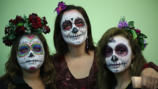 women in purple and black tops thumbnail