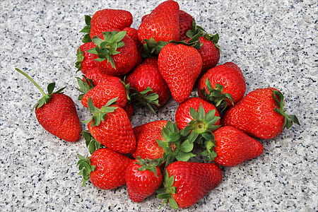 strawberries on white marble surface thumbnail