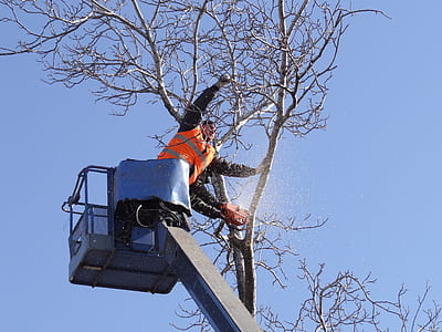 man riding on bucket lift thumbnail