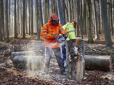 man using chainsaw thumbnail