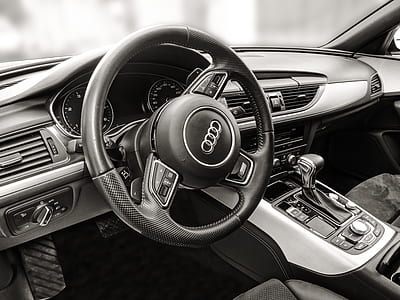 grayscale photo of Audi steering wheel thumbnail