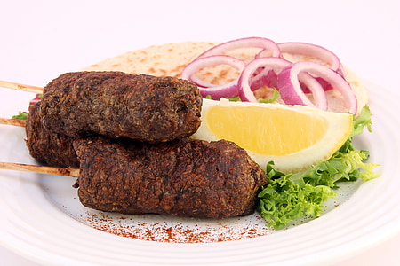 Kebab on white ceramic plate thumbnail