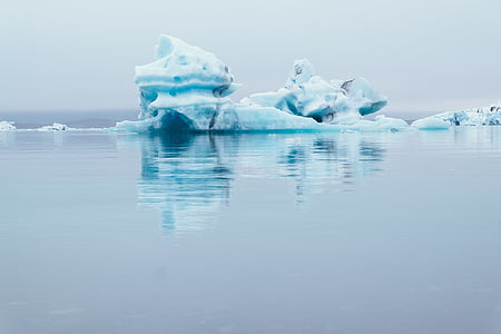 ice berg on body of water thumbnail