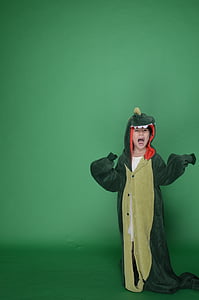child wearing dinosaur costume thumbnail