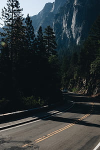 bus running on winding road thumbnail