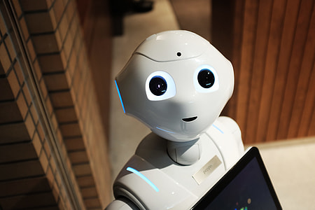 photo of white robot standing inside room thumbnail