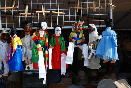 assorted-color string puppets thumbnail