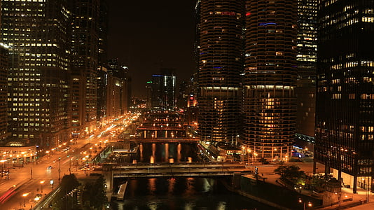 city of high-rise buildings during nighttime thumbnail