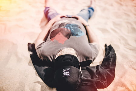 man in brown and black cap thumbnail