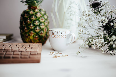 Wooden keyboard and cup of coffee thumbnail