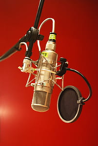 gold-colored and black condenser microphone thumbnail