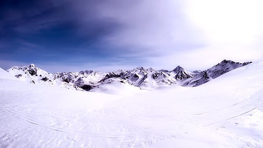 mountain covering snow during daytime thumbnail